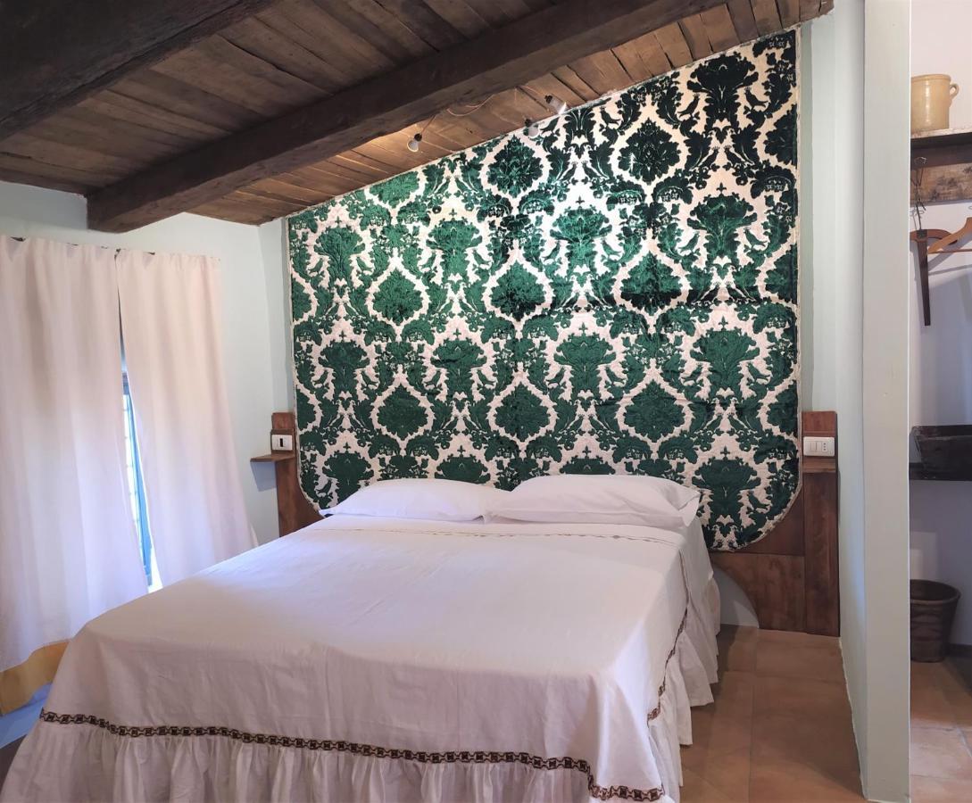 Il Nibbio - Soffitta Delle Ginestre Apartment โมราโนคาลาโบร ภายนอก รูปภาพ